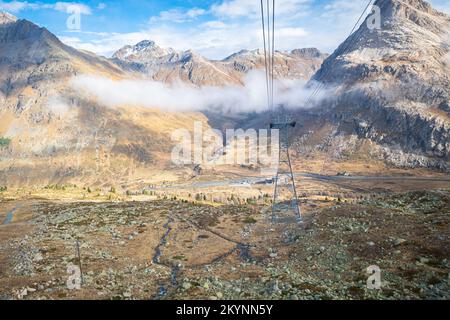 Wide view over the Swiss mountains from the cable car to Refugio Diavolezza in Bernina Valley, Switzerland Stock Photo