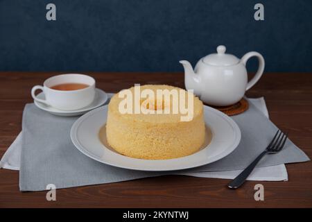 plain chiffon cake hot tea set isolated on white background Stock Photo