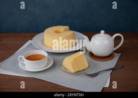plain chiffon cake hot tea set isolated on white background Stock Photo