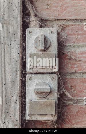 Old cobweb-covered switches in the factory Stock Photo