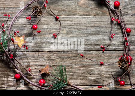 Grape vine traditional Christmas decorations, farmhouse style, on a wooden background, no text Stock Photo