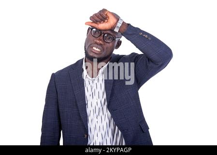 portrait of a handsome worried adult businessman holding hand on forehead. Stock Photo