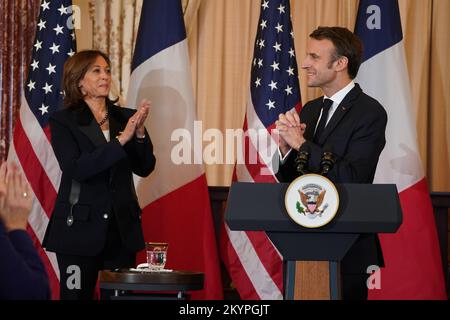 French President Emmanuel Macron smiles at the Elysee palace in Paris ...