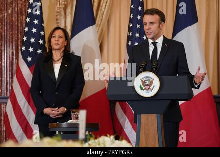 Washington, United States. 01st Dec, 2022. French President Emmanuel Macron delivers remarks as Vice President Kamala Harris listens at a luncheon in his honor at the State Department in Washington, DC on Thursday, December 1, 2022. Photo by Leigh Vogel/UPI Credit: UPI/Alamy Live News