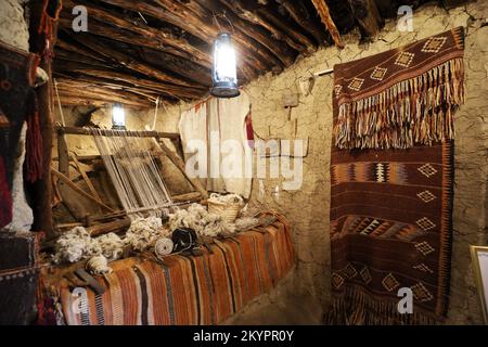 old traditional crafts in old arab mud house interior- Al Malad heritage Museum - Al Baha , Saudi Arabia Stock Photo