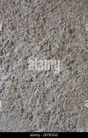 weathered concrete surface, close-up of old and worn cement or mortar wall, full frame background texture, construction and masonry concept Stock Photo