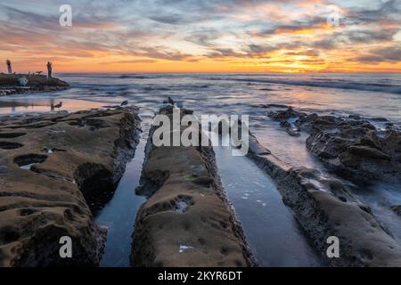 Looking out at ocean in Southern California at sunset Stock Photo