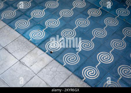 Blue and white cement tiled floor in Oaxaca City, Mexico Stock Photo