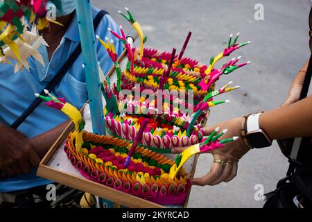 Colorful art handmade krathong or floating lantern basket craft for thai people select buy and into float at river forgiveness from the Goddess of wat Stock Photo