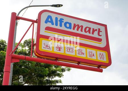 Kudus Indonesia - August, 2023 : PT Sumber Alfaria Trijaya Tbk or Alfamart is a primarily-franchised Indonesian convenience store chain, with stores Stock Photo