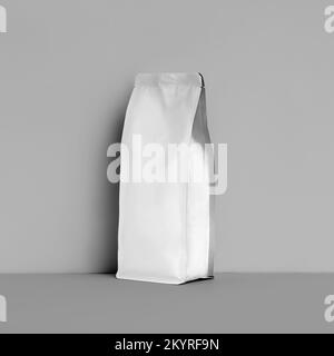 Mockup of white gusset packaging for coffee beans, coffee pouch, isolated on wall background. Template doypack with degassing valve, bag for tea, for Stock Photo