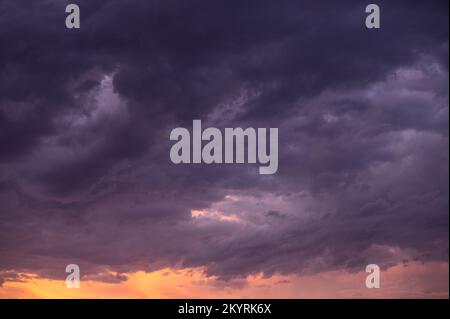 Dark clouds seen in sky shot from low angle Stock Photo