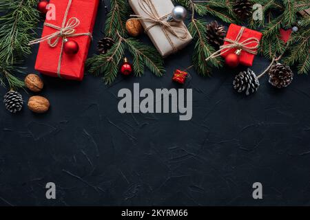 Christmas banner with many gift boxes with paper decorations on blue plaster background. Christmas background. Stock Photo