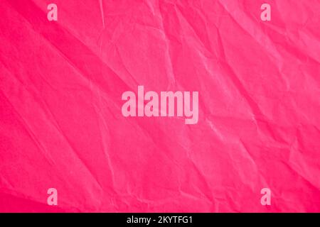 an empty wrinkled tissue paper textured background In Color of the year 2023 vibrates with vim and vigor magenta Stock Photo