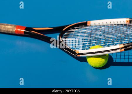 Broken tennis racket on clay tennis court Stock Photo