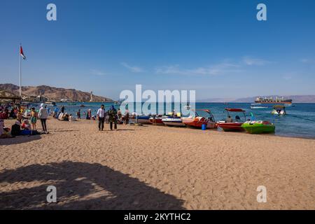 Al-Ghandour Beach in Aqaba Jordan looking towards the hills of Isreal and Egypt Stock Photo