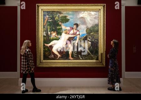 London, UK.  2 December 2022. Staff members view 'Venus and Adonis', 1555-57, by Titian (Est. £8-12 million) at a preview of Sotheby’s Old Masters evening sale.  Works from a 13th century gold ground painting, to the pioneering 17th century female painter Elisabetta Sirani, and concluding with John Constable and Frederick, Lord Leighton will be auctioned at Sotheby’s New Bond Street galleries on 7 December.  Credit: Stephen Chung / Alamy Live News Stock Photo