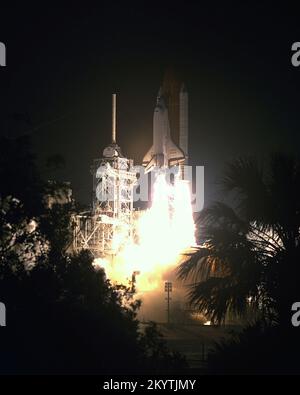 STS-56 Launch - The Space Shuttle Discovery lifts off from Launch Pad 39B on Mission STS-56 at 1:29:00 a.m., EDT, April 8. First attempt to launch Discovery on its 16th space voyage was halted at T-11 seconds on April 6. Aboard for the second Space Shuttle mission of 1993 are a crew of five and the Atmospheric Laboratory for Applications and Science 2, the second in a series of missions to study the sun's energy output and Earth's middle atmosphere chemical makeup, and how these factors affect levels of ozone. Stock Photo