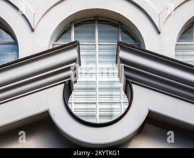 Architectural stone detail and windows of an old house in Zaandam, Netherlands Stock Photo