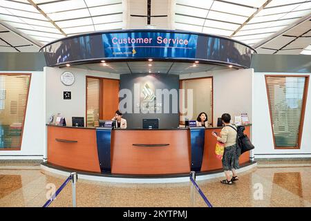 SINGAPORE - NOVEMBER 07, 2015: staff at Changi airport. Singapore Changi Airport, is the primary civilian airport for Singapore, and one of the larges Stock Photo