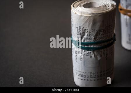 British shopping receipts roled in england uk. Stock Photo