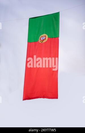 Canadian flag is hanging in a isolated blue  sky Stock Photo