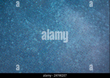 Mosaic sqaure pool tiles on bottom close up view Stock Photo