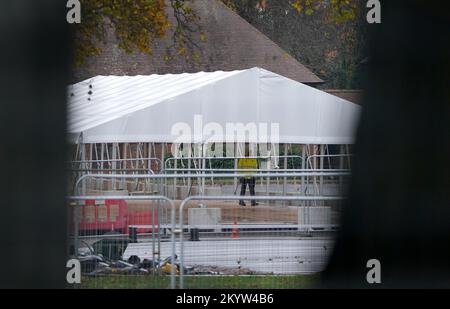 A view of temporary buildings under construction which are used to temporarily house people thought to migrants at the Manston immigration short-term holding facility located at the former Defence Fire Training and Development Centre in Thanet, Kent. Picture date: Friday December 2, 2022. Stock Photo