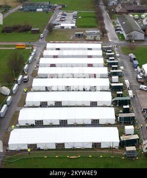 A view of temporary buildings which are used to temporarily house people thought to migrants at the Manston immigration short-term holding facility located at the former Defence Fire Training and Development Centre in Thanet, Kent. Picture date: Friday December 2, 2022. Stock Photo