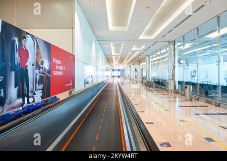 DUBAI, UAE - NOVEMBER 16, 2015: interior of Dubai Airport. Dubai International Airport is the world's busiest airport by international passenger traff Stock Photo