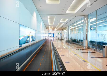 DUBAI, UAE - NOVEMBER 16, 2015: interior of Dubai Airport. Dubai International Airport is the world's busiest airport by international passenger traff Stock Photo