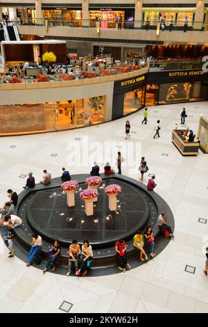 HONG KONG - MAY 06, 2015: interior of the Landmark shopping mall. The Landmark, also known as 'Central', is one of the oldest and most prominent shopp Stock Photo