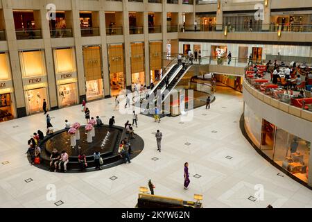 HONG KONG - MAY 06, 2015: interior of the Landmark shopping mall. The Landmark, also known as 'Central', is one of the oldest and most prominent shopp Stock Photo