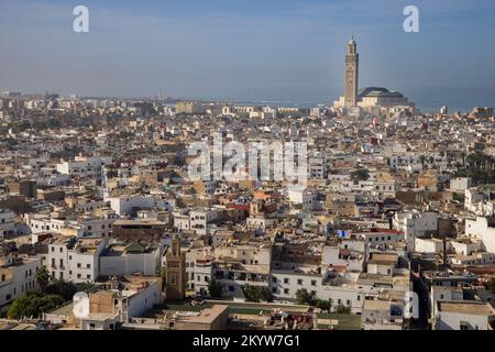 medina or old town in the city of casablanca dominated by the huge hassan II mosque morocco Stock Photo