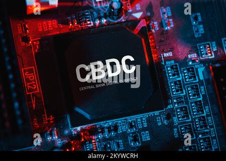 CBDC - central bank digital currency technology. Computer chip on mainboard Stock Photo
