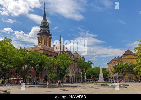 Subotica, Serbia - August 01, 2022: Historic Building City Hall and Monuments Landmarks at Liberty Square Hot Summer Day. Stock Photo