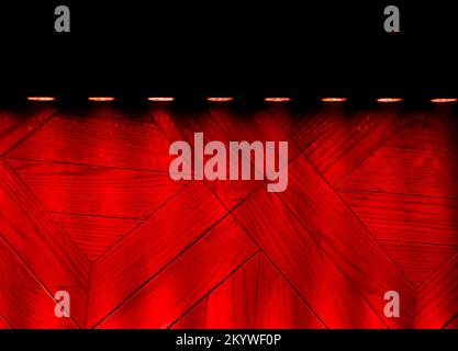 Red light lighting up wooden floor Stock Photo