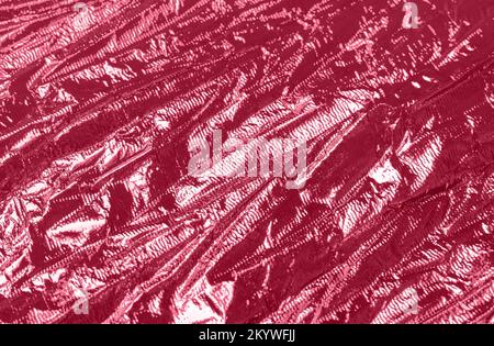 Holographic abstract magenta textured background. Retro wave concept. Color trend year 2023. Stock Photo