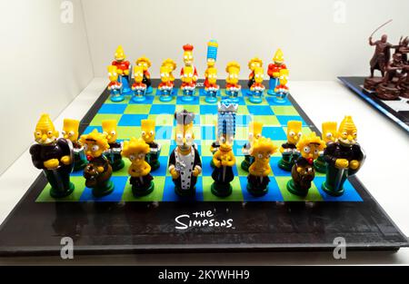 The Simpsons chess made in U.S.A. Simpsons-themed chess set. Chess sets from US. Chess pieces. Chess figure.United States. Plastic Stock Photo