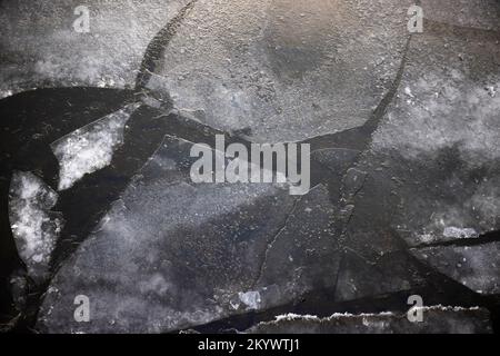 Pieces of ice floes float on the surface Stock Photo