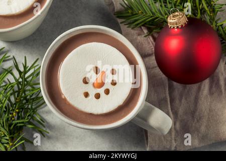 Warm Hot Chocolate with a Snowman Marshmallow Ready to Drink Stock Photo