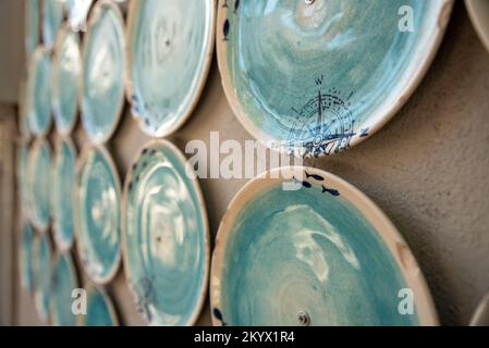 Decorative plates on the wall , sustainable design concept , wall decoration  Stock Photo