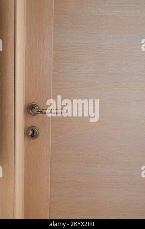 Close-up of a door in beige color - modern design Stock Photo