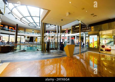 SINGAPORE - NOVEMBER 08, 2015: view on Rain Oculus. Rain Oculus is a large whirlpool forms inside a 70 foot diameter acrylic bowl and falls 2 stories Stock Photo