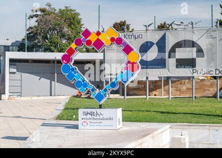 Thessaloniki, Greece - September 29, 2022: Visit Thessaloniki symbol. Stock Photo