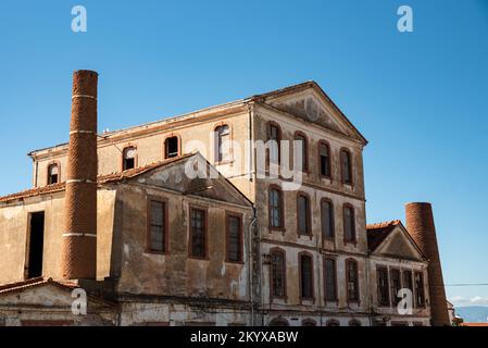 Ayvalik, Turkey - July 19, 2022 : Street view in Ayvalik. Ayvalik is an old town by the Aegean Sea. historical olive fabric Stock Photo