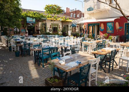 Ayvalik, Turkey - July 19, 2022 : Street view in Cunda Island in Ayvalik. places where people have fun outdoors Stock Photo