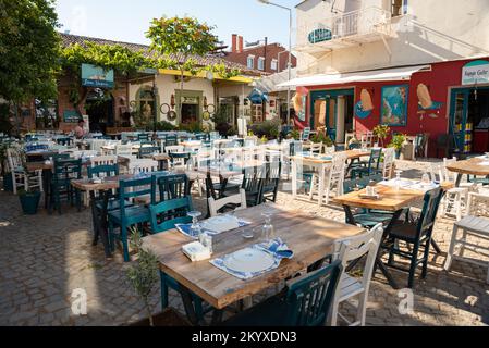 Ayvalik, Turkey - July 19, 2022 : Street view in Cunda Island in Ayvalik. places where people have fun outdoors Stock Photo