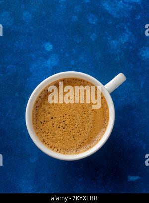 Cup of fresh espresso with delicious crema, top view Stock Photo