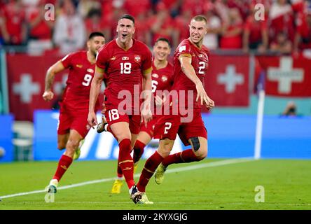 Serbia's Dusan Vlahovic (centre) celebrates scoring their side's second goal of the game during the FIFA World Cup Group G match at Stadium 974 in Doha, Qatar. Picture date: Friday December 2, 2022. Stock Photo